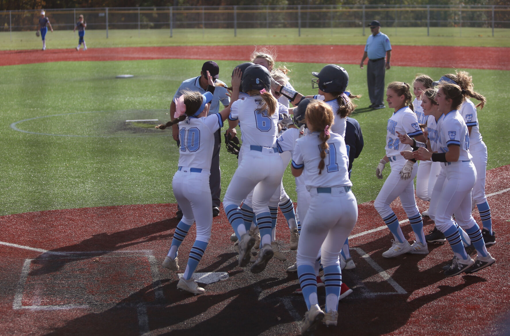 The Tolton Trailblazers softball team celebrates winning the district championship game